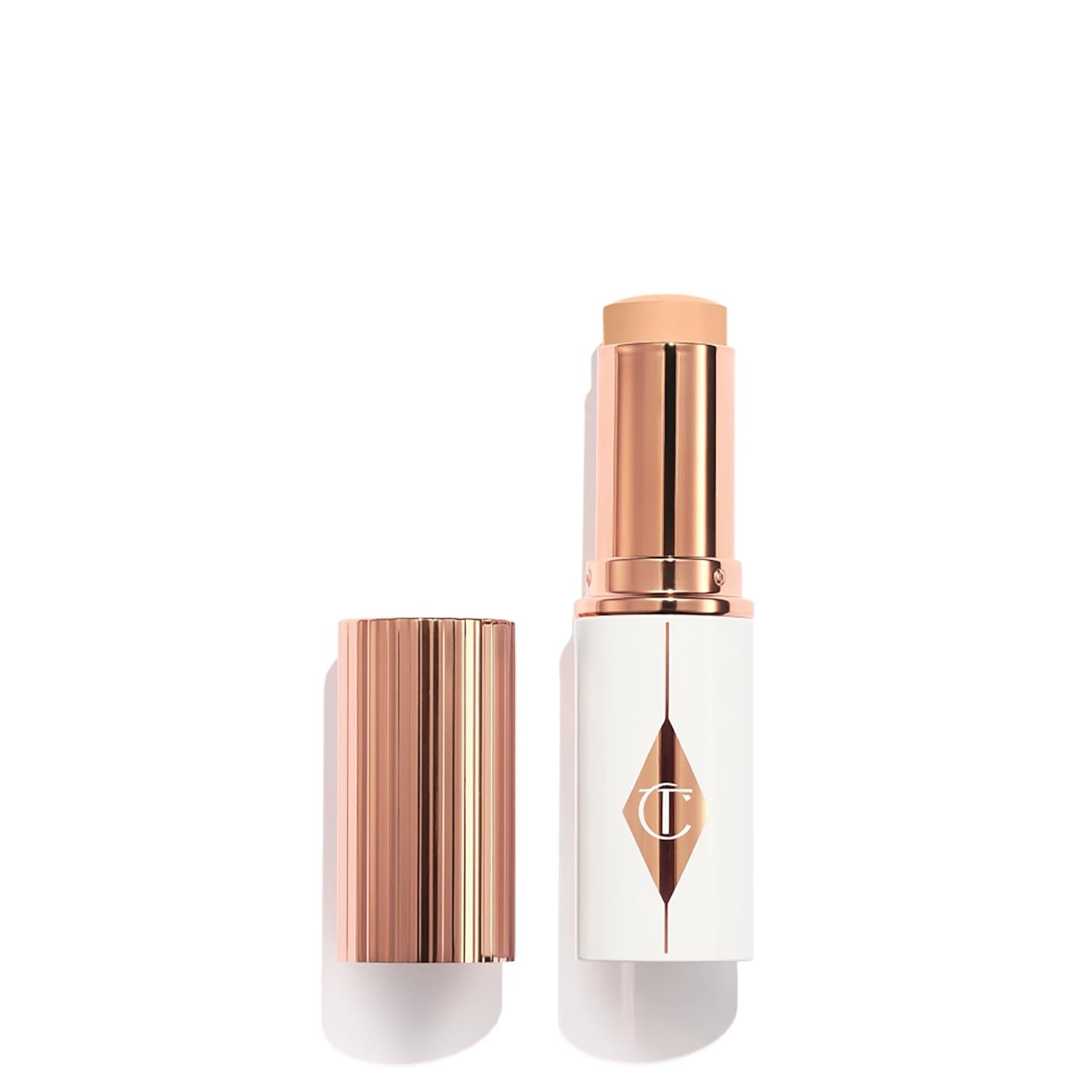 Charlotte Tilbury Unreal Skin Tint & Sheer Glow Hydrating Foundation Stick – Cream Foundation Makeup with Sheer-to-Light Coverage & a Buildable Formula – Blurring, Smoothing & Nourishing
